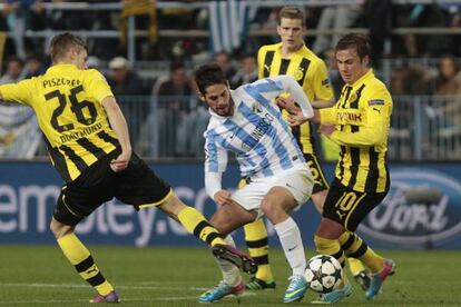 Isco, entre Piszczek, Bender y Götze.