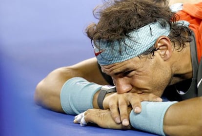 Rafael Nadal receives medical treatment during his men&#039;s final match against Stanislas Wawrinka at the Australian Open. 