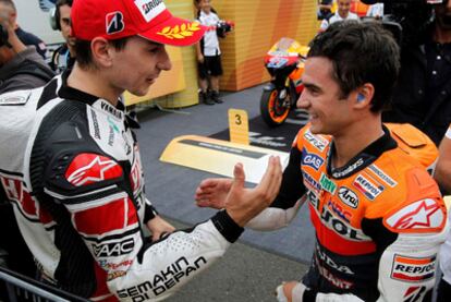 Pedrosa and Lorenzo salute each other after the race.