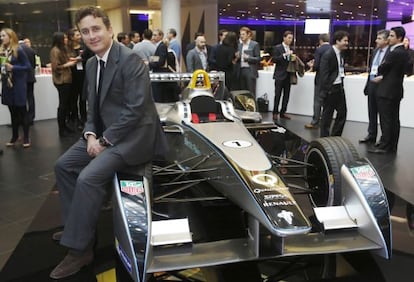 Alejandro Agag poses with a Formula E car in London last November.