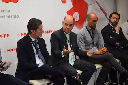 José Manuel Inchausti, consejero delegado de Mapfre en España, en el centro de la foto.