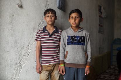 Mustafa (16), pictured left with his brother Anas (12), said he makes good bread. The secret, he said, is to have patience when the dough rises; leaving it for as long as possible to rise. The time depends on the weather and temperature. He said it is also important to sift the flour well, and break the dough with your hands – that must be clean. With their father injured by falling shrapnel in Syria and unable to work, Mustafa and Anas have become the breadwinners for their family of seven. Every weekend Mustafa works from 4.30am to 7pm making bread in the local bakery in their new home town of Kulul, Turkey, where their family has sought refuge for the past three years. A town minutes from the Syrian border, and whose population has doubled with the influx of Syrian refugees. Each day before school, Anas sells fresh bread from the same bakery outside his school for “around one hour”. He has become something of a regular now, holding a board of bread shouting “Taza semit” (fresh bread) to all going past. Despite the hard work, the boys say they feel proud they can help their family. Both still want to work hard at school to reach their dreams. Mustafa a doctor, and Anas a policeman. #WithSyria #Notnumbers.People Photographer: Eduardo Soteras Jalil