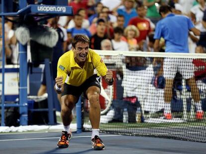 Tommy Robredo celebrates his straight sets victory over Roger Federer on Monday. 