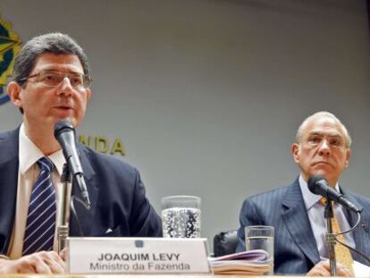 Joaquim Levy y &Aacute;ngel Gurr&iacute;a, en Brasilia. 