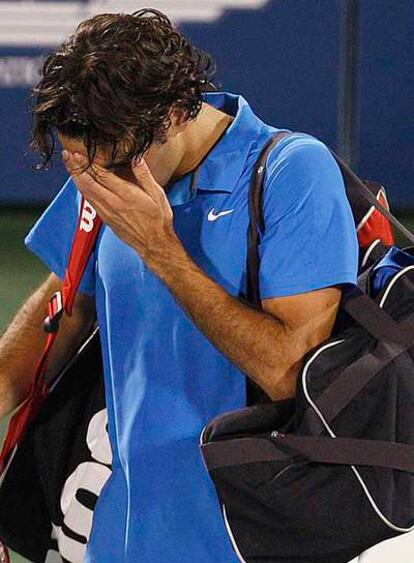 Federer, abatido tras su derrota ante Murray.