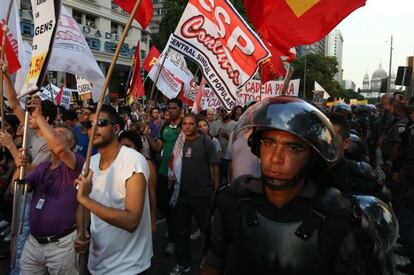 Brazilians hold a protest in São Paulo on Saturday.