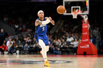 Orlando Magic forward Paolo Banchero (5) plays during the second half of an NBA basketball game against the Washington Wizards, Friday, March 31, 2023, in Washington.