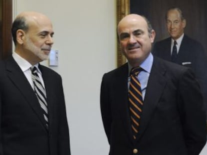Ben Bernanke y Luis de Guindos.