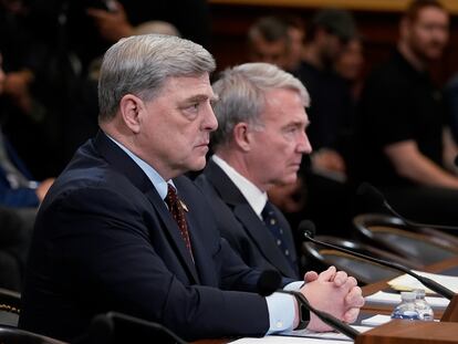 Retired Gen. Mark Milley, left, the former chairman of the Joint Chiefs of Staff, left, and retired Gen. Kenneth McKenzie, former commander of the U.S. Central Command, speak to the House Foreign Affairs Committee about the U.S. withdrawal from Afghanistan, at the Capitol in Washington, March 19, 2024.
