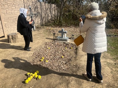Pilgrims visit Sister Wilhelmina's former grave.