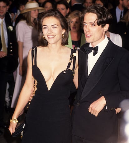 Elizabeth Hurley and Hugh Grant at the premiere of 'Four Weddings and a Funeral.'