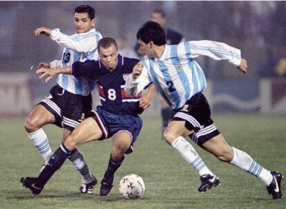 Stewart, entre Altamirano y Ayala, en 1995.