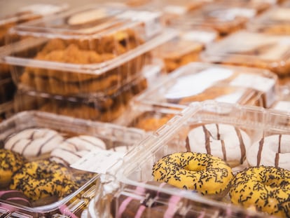 A production line of ultra-processed industrial donuts.