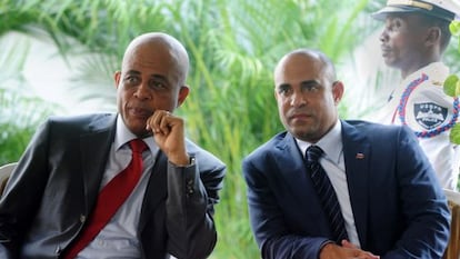 El presidente haitiano Michel Martelly y su primer ministro, Laurent Lamorthe.