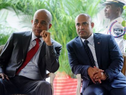 El presidente haitiano Michel Martelly y su primer ministro, Laurent Lamorthe.