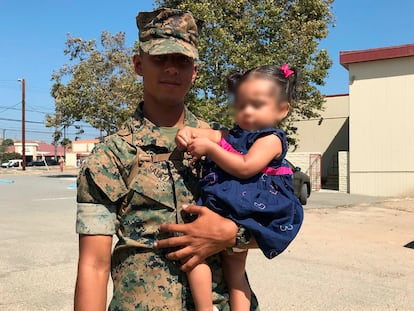 U.S. Marine Roberto Salazar with his daughter.