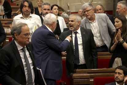 Angry scenes between lawmakers inside the Catalan parliament on Thursday.