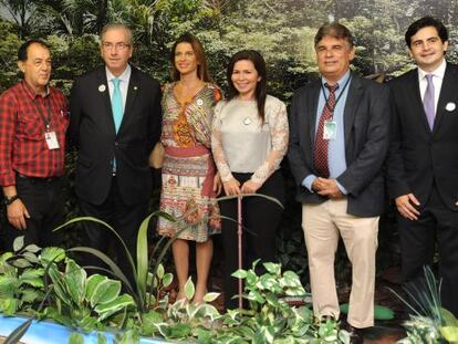 Cunha com a mulher, Claudia Cruz, ao lado, em evento da Câmara Itinerante no Amazonas, em junho.