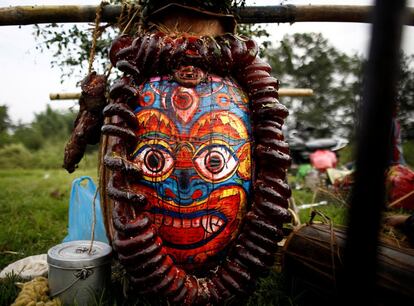 Buffalo intestine offered on the portrait of God Bhairav covered in blood stains is pictured during the Shikali festival at Khokana village in Lalitpur, Nepal October 7, 2016. REUTERS/Navesh Chitrakar