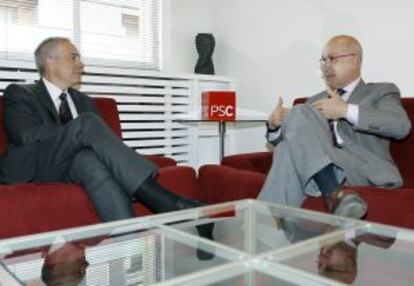 Pere Navarro y Josep Antoni Duran, en su reunión de ayer.