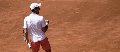 Djokovic celebra un punto contra Fritz.