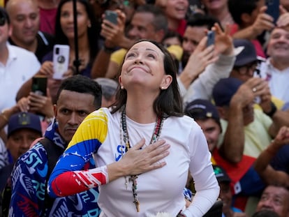 Venezuelan opposition leader Maria Corina Machado addresses supporters during a protest against President Nicolas Maduro the day before his inauguration for a third term, in Caracas, Venezuela, Thursday, Jan. 9, 2025. (AP Photo/Ariana Cubillos)