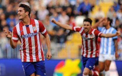 Koke, con Villa detrás, celebra el gol de la victoria.