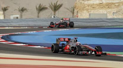 Los corredores de McLaren Jenson Button y Lewis Hamilton.