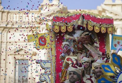 King Melchior during the Three Kings parade in Seville.