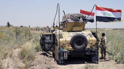 Tropas iraquíes, antes de la entrada en la ciudad.