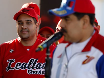 Nicolás Maduro Guerra, filho do presidente da Venezuela, Nicolás Maduro, observa o pai durante um discurso em Caracas, em 2018.