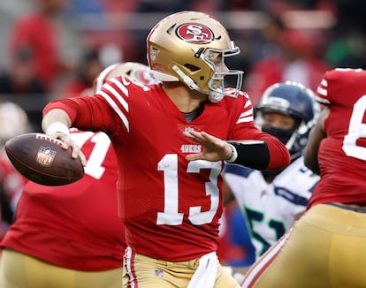 San Francisco 49ers quarterback Brock Purdy passes against the Seattle Seahawks during the fourth quarter of the NFL wildcard playoff game at Levi's Stadium in Santa Clara.