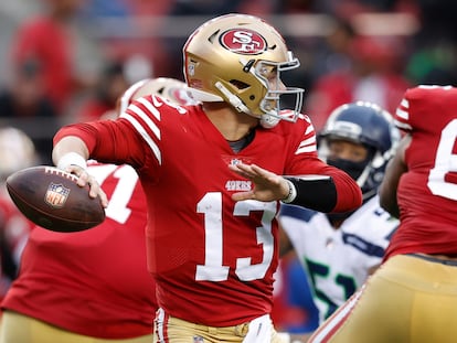 San Francisco 49ers quarterback Brock Purdy passes against the Seattle Seahawks during the fourth quarter of the NFL wildcard playoff game at Levi's Stadium in Santa Clara.