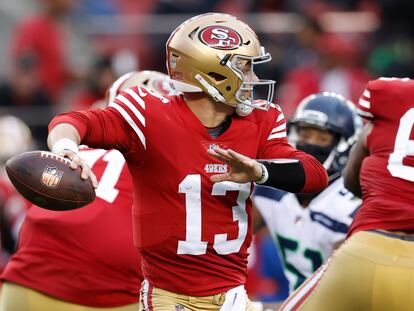 San Francisco 49ers quarterback Brock Purdy passes against the Seattle Seahawks during the fourth quarter of the NFL wildcard playoff game at Levi's Stadium in Santa Clara.