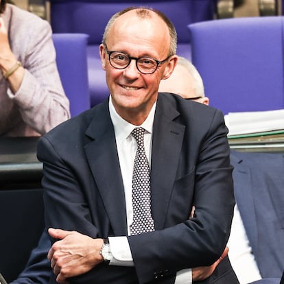 Berlin (Germany), 18/03/2025.- Christian Democratic Union (CDU) party and faction chairman Friedrich Merz (C) reacts after casting his vote during a special plenary session of the German parliament 'Bundestag', in Berlin, Germany, 18 March 2025. The German Bundestag is voting on a draft law to ease the debt brake for defence spending, including a 500 billion euro fund for investments in infrastructure and climate neutrality. (Alemania) EFE/EPA/FILIP SINGER
