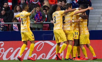 Los jugadores del Girona celebran el gol del empate ante el Atl&eacute;tico, obra de Portu 