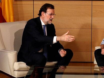 Mariano Rajoy com Pablo Iglesias