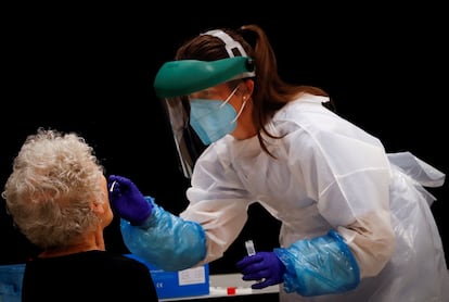 A health worker in the Basque Country testing residents of San Sebastián.