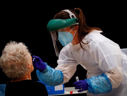 A health worker in the Basque Country testing residents of San Sebastián.