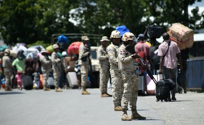 Dominican soldiers guard the border between the Dominican Republic and Haiti on Sept. 14, 2023.