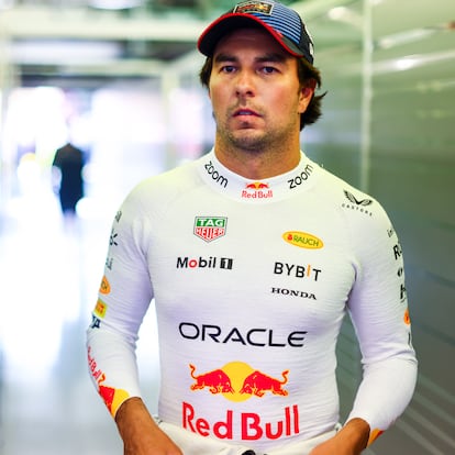 MELBOURNE, AUSTRALIA - MARCH 23: Sergio Perez of Mexico and Oracle Red Bull Racing looks on in the garage during qualifying ahead of the F1 Grand Prix of Australia at Albert Park Circuit on March 23, 2024 in Melbourne, Australia. (Photo by Mark Thompson/Getty Images)