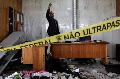 A person inspects the damage, after the supporters of Brazil's former President Jair Bolsonaro anti-democratic riot at Planalto Palace, in Brasilia, Brazil, January 9, 2023. REUTERS/Ueslei Marcelino