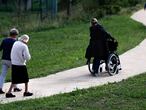 Alzheimer's patients walk at the Village Landais Alzheimer site in Dax, France, September 24, 2020. Picture taken on September 24, 2020. REUTERS/Gonzalo Fuentes