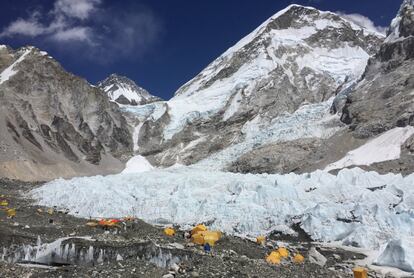 This April 10, 2016 photo shows yellow and orange tents at Everest Base Camp, pitched on the edges of the Khumbu icefall in Nepal. A trek to Everest Base Camp along mountain paths hugging it's deep gorges offers renewal and a test of mental and physical limits. A trek to Everest Base Camp along mountain paths that hug deep gorges offers renewal and a test of mental and physical limits. Along the way there are sore knees and altitude sickness, but the spectacular landscapes, friendly villagers and moments of tranquility make the journey an unforgettable experience. (AP Photo/Karin Laub)