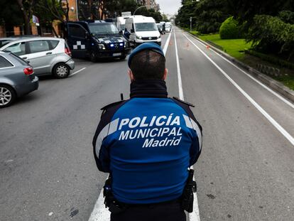 Municipal police in Madrid carry out traffic stops in April.