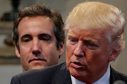 Donald Trump, en primer plano, y su abogado Michael Cohen. 