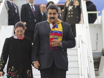 President Nicolás Maduro and Cilia Flores arrive in Geneva on Thursday.