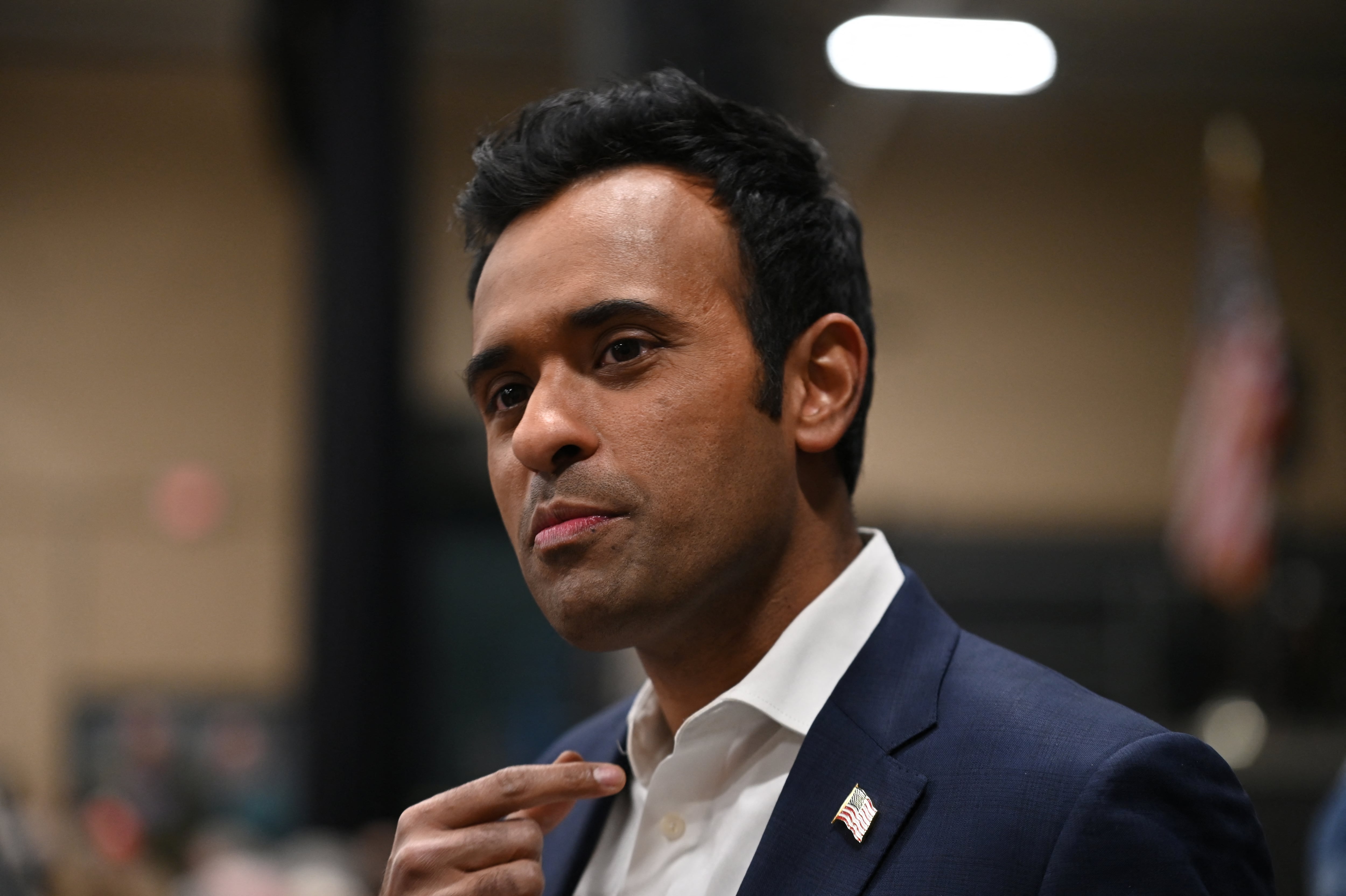 Republican presidential candidate and businessman Vivek Ramaswamy visits a caucus site at Horizon Event Center in Clive, Iowa, U.S. January 15, 2024. REUTERS/Sergio Flores