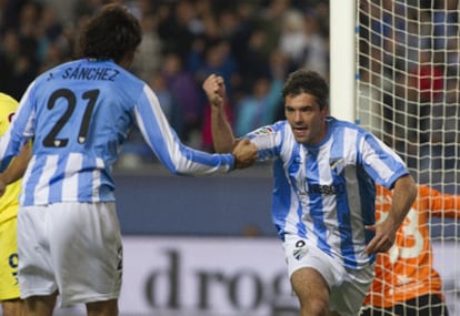 Toulalan celebra el primer gol del Málaga.