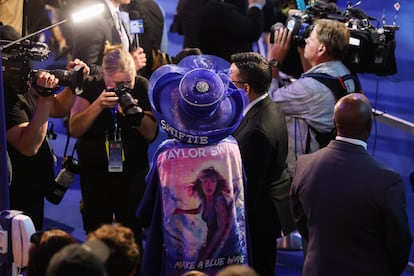 An attendee wears a Taylor Swift themed outfit during day one of the Democratic National Convention at the United Center, in Chicago, August 19, 2024. 